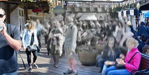 Simulated vision with diabetic maculopathy, showing blurred and darkened central vision, as seen in a busy outdoor setting
