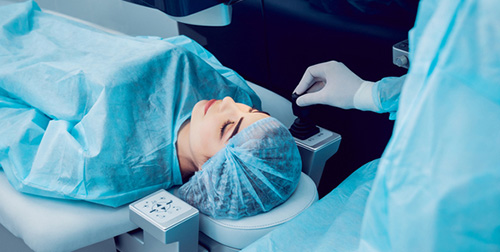 Patient undergoing LASIK eye surgery with advanced laser equipment at Moorfields Eye Hospital Dubai