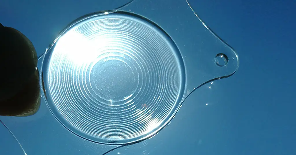 Close up of an artificial intraocular lens used in cataract surgery